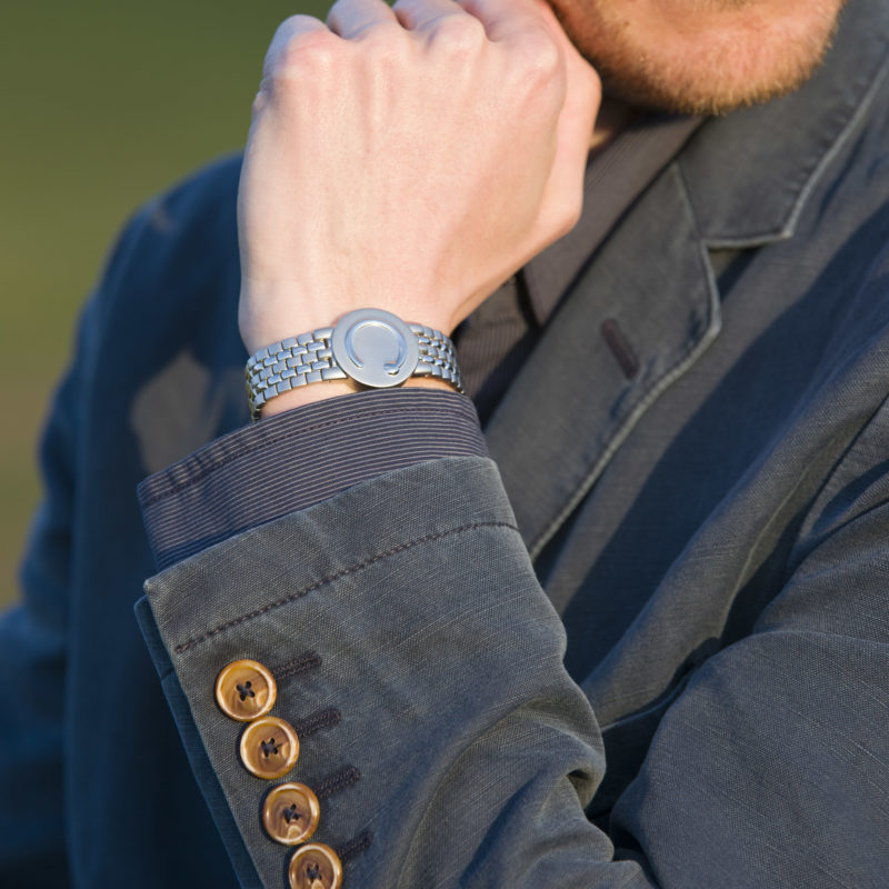 man wearing a stainless steel elite wristband