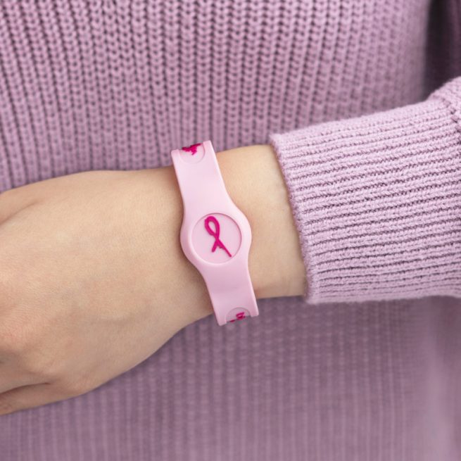 lady wearing a Pink Flex Sport Bioflow wristband