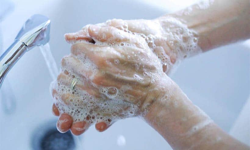 Covid-19 woman washing hands